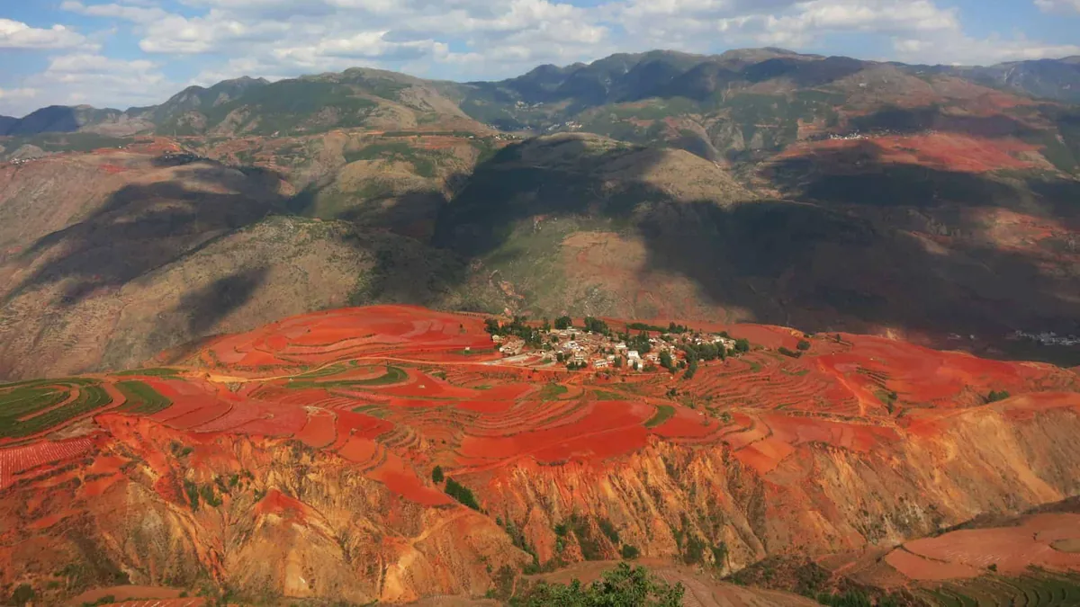 Dongchuan Red Land · Crimson terraces unfurling